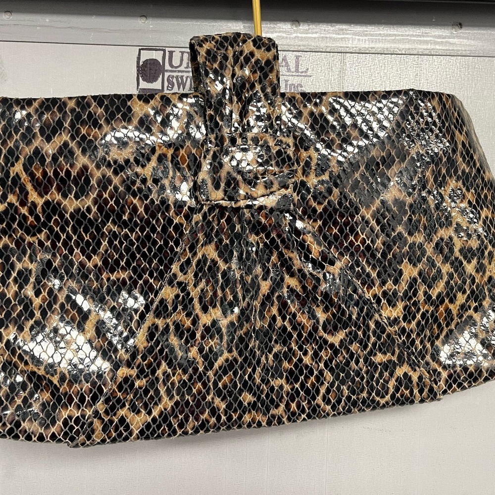 LEOPARD PRINT LEATHER CLUTCH BAG BY SHEILA ELAINE